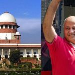 Manish Sisodia, smiling, standing next to the dome of the Supreme Court of India building.